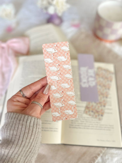 Swans, butterfly and read books Bookmarks
